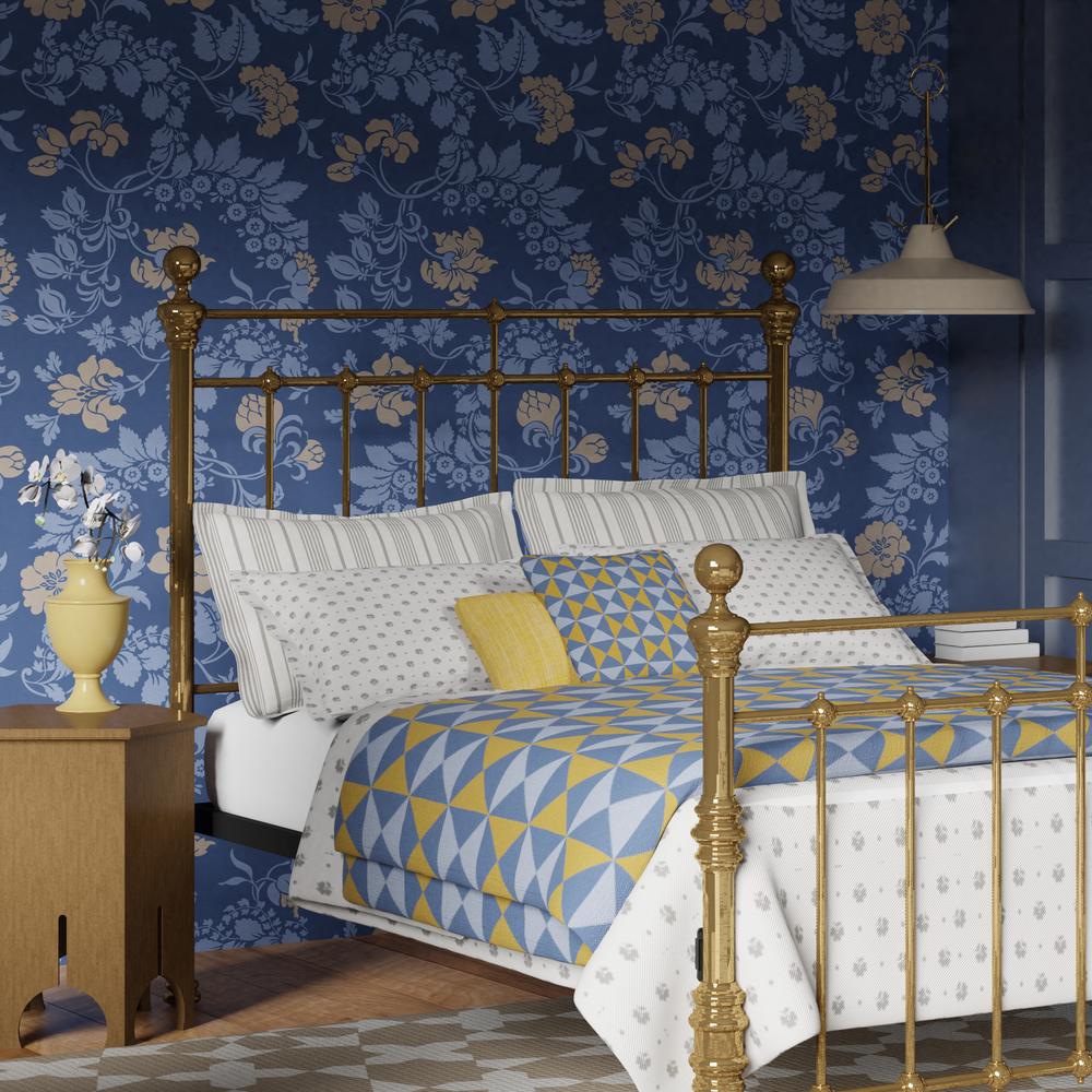 Waterford bed in a blue and gold bedroom
