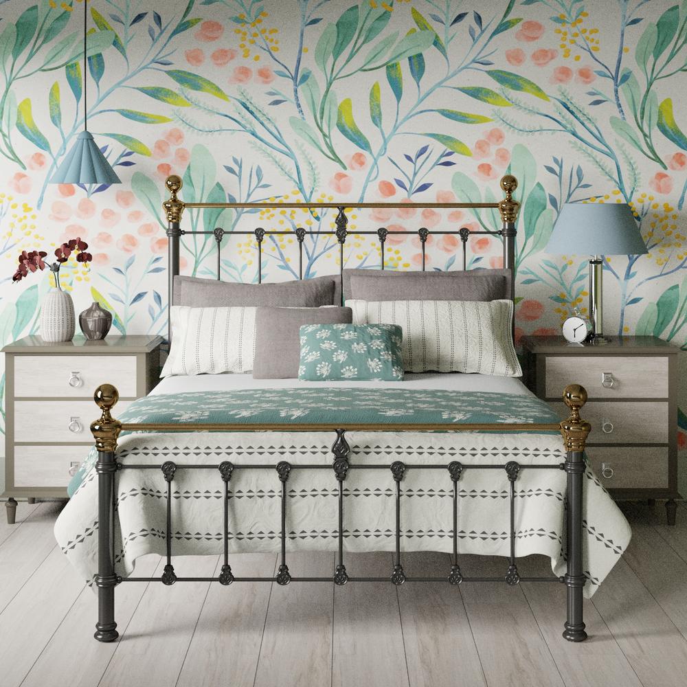 Hamilton low footend iron bed with a spring floral wallpaper