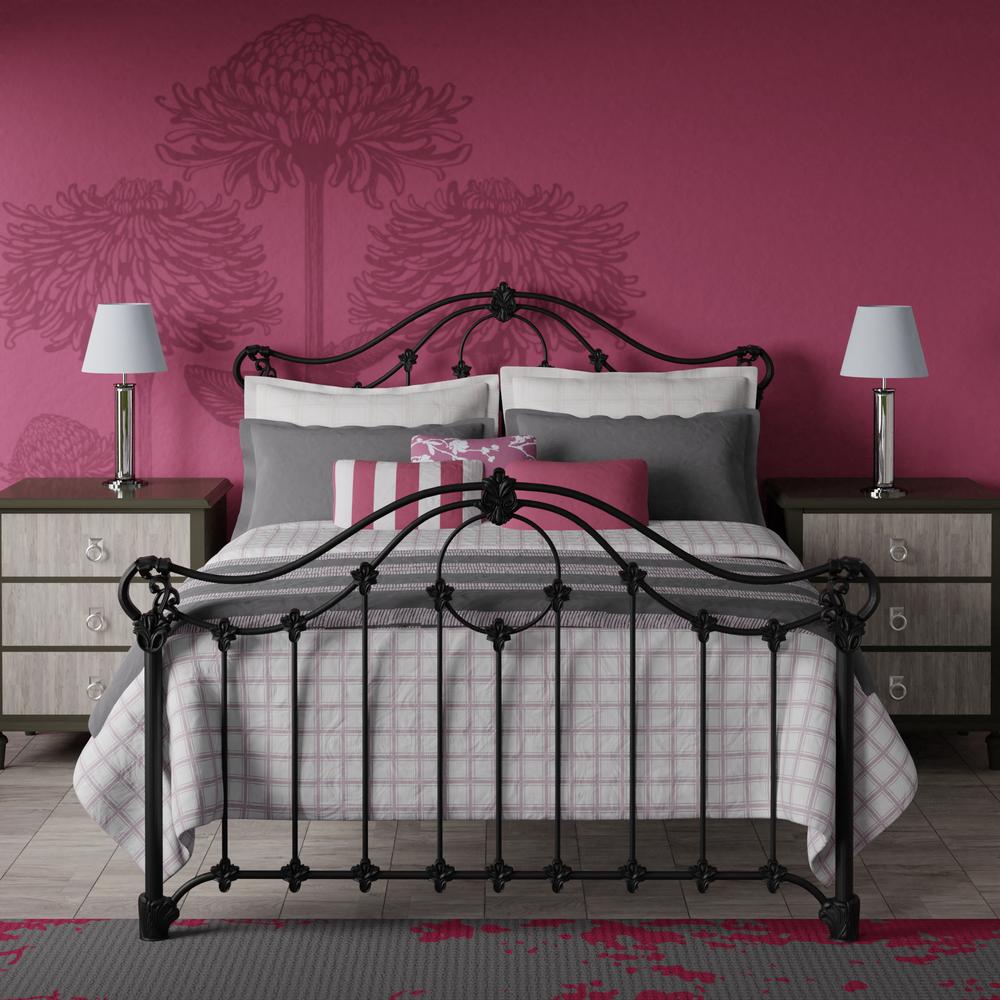 Alva bed in black, with a bright pink wall and grey linens