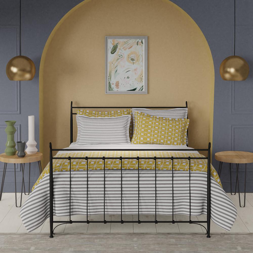 Tiffany iron bed in black with yellow linens